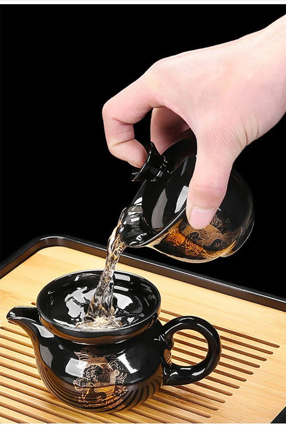 Black-glazed koi tea set